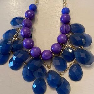 Purple and blue bib necklace with matching earrings